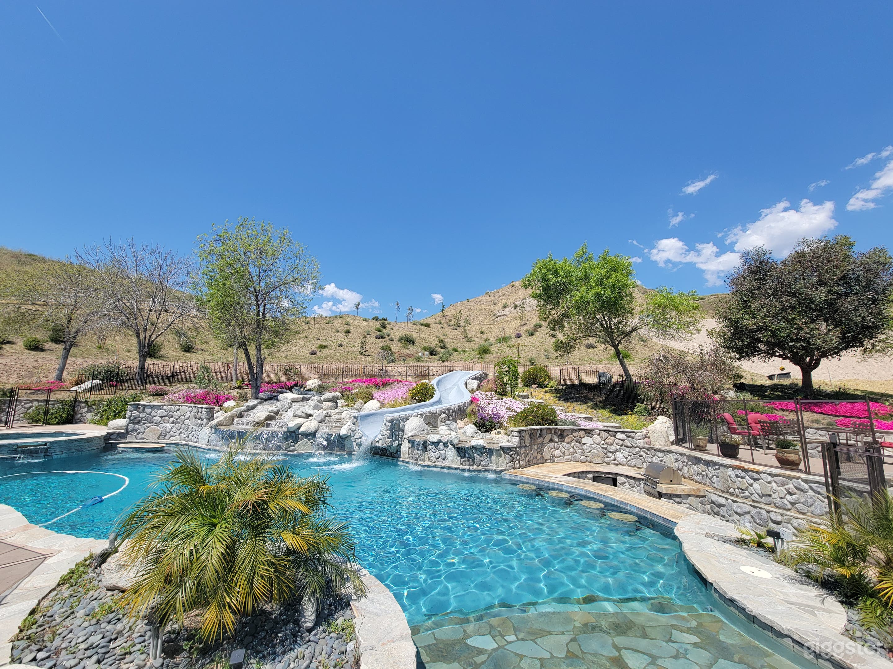 Resort Style Pool with Waterfalls Photo 4