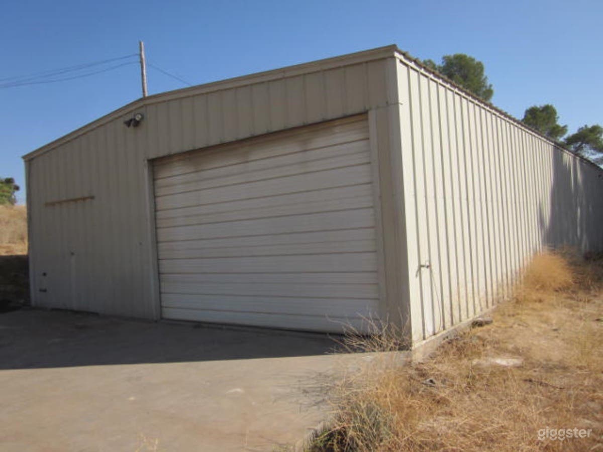 Warehouse / shop 76 feet long x 36 feet wide.