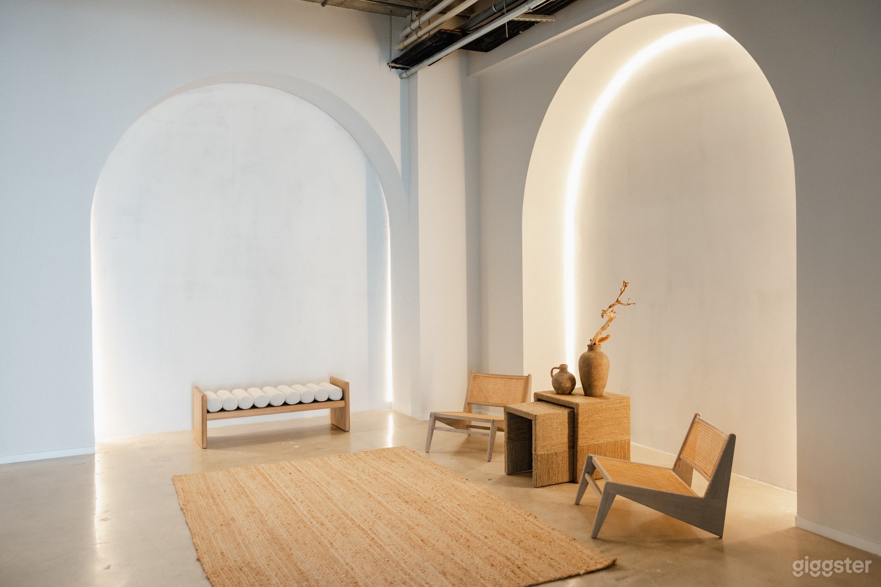 A spacious 1,500 sq. ft. area with ample seating and two oversized arches, perfect for branding, art exhibitions, or networking events. Equipped with a projector, this area is ideal for presentations, product showcases, or cocktail receptions.