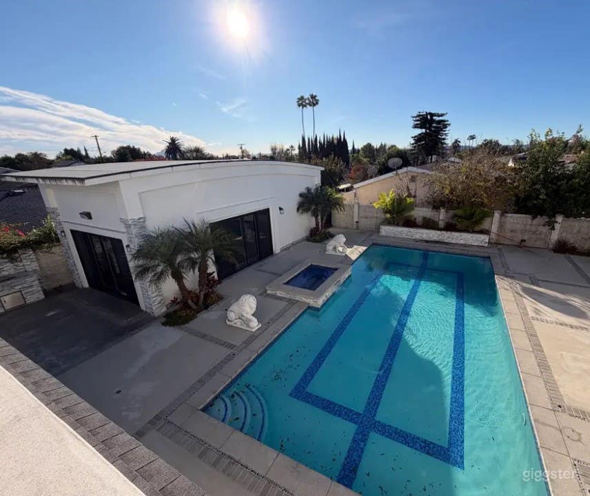 Pool Framed with Modern Stone Photo 4