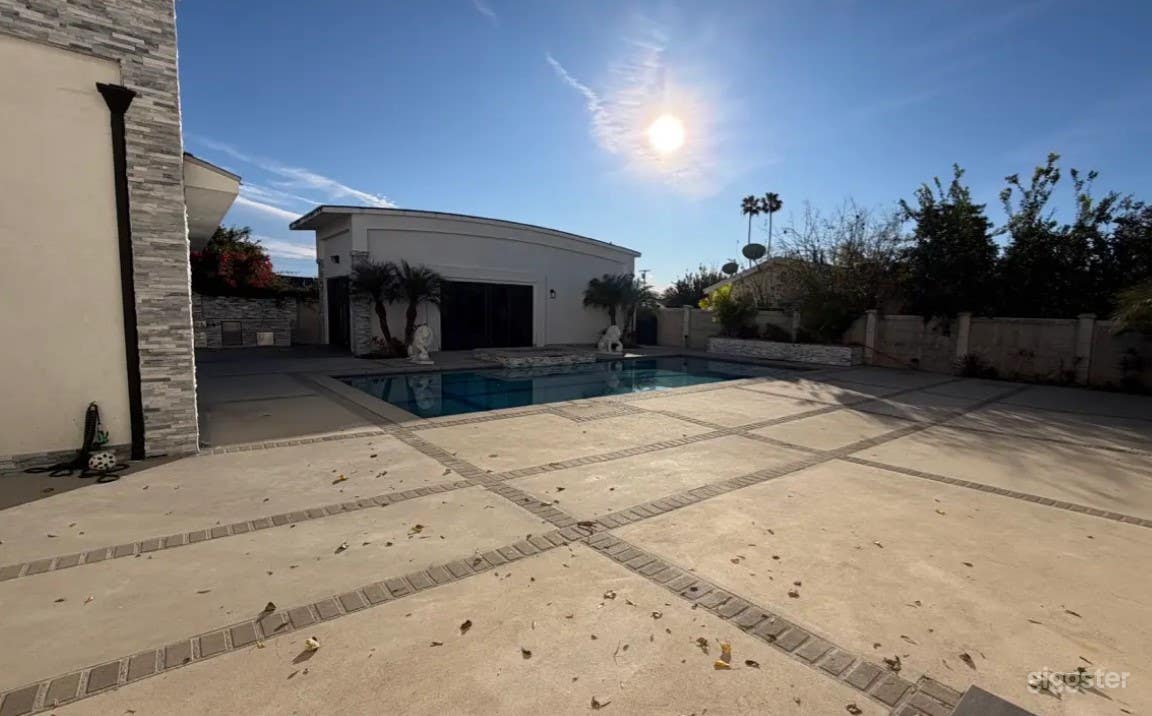 Pool Framed with Modern Stone Photo 3