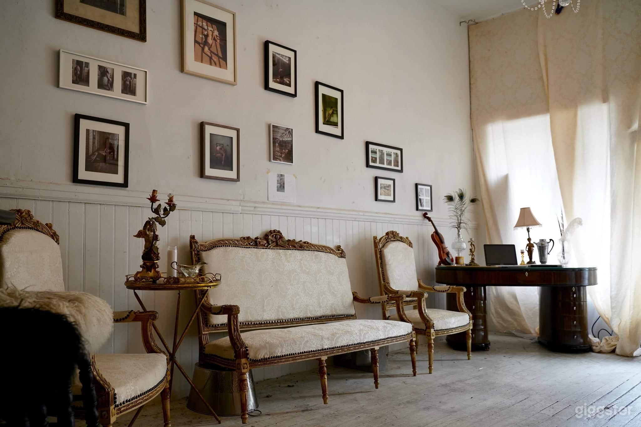 Elegant Indoor Space with Antique Furnishings Photo 1