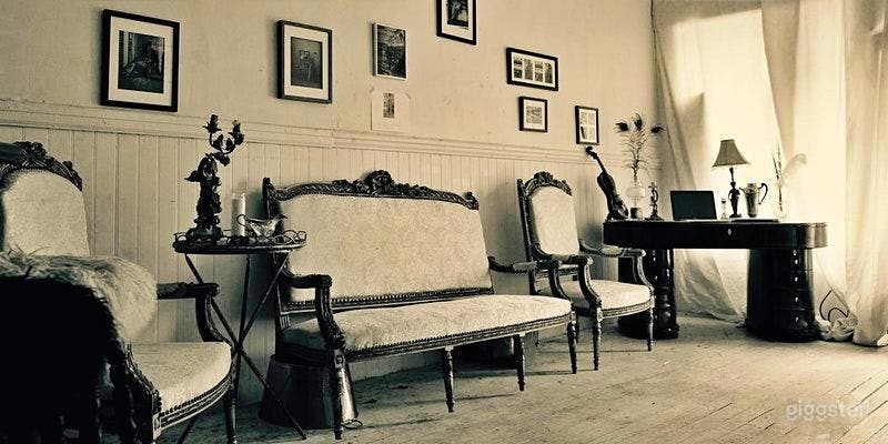 Elegant Indoor Space with Antique Furnishings Photo 4