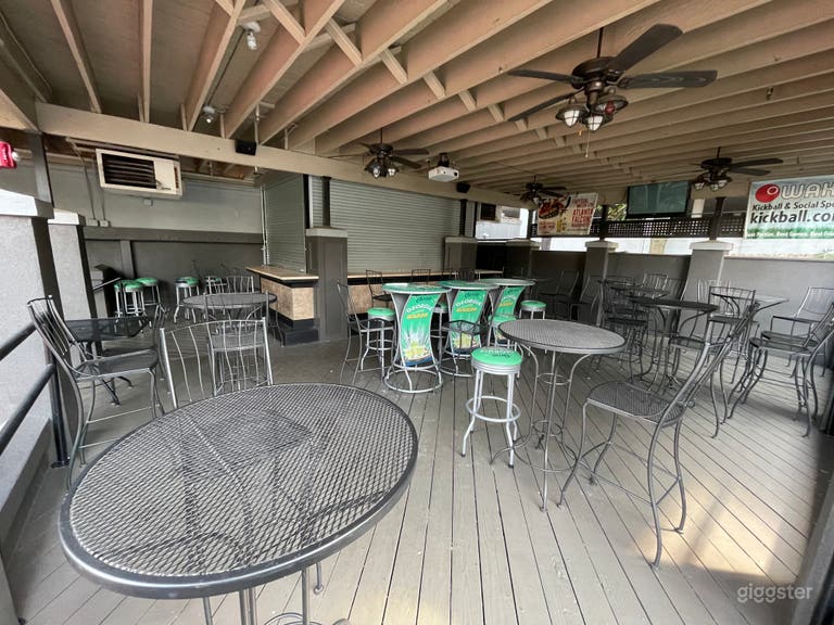  Patio bar; extensive space with a projector and pub tables and an 8 seat bar. 