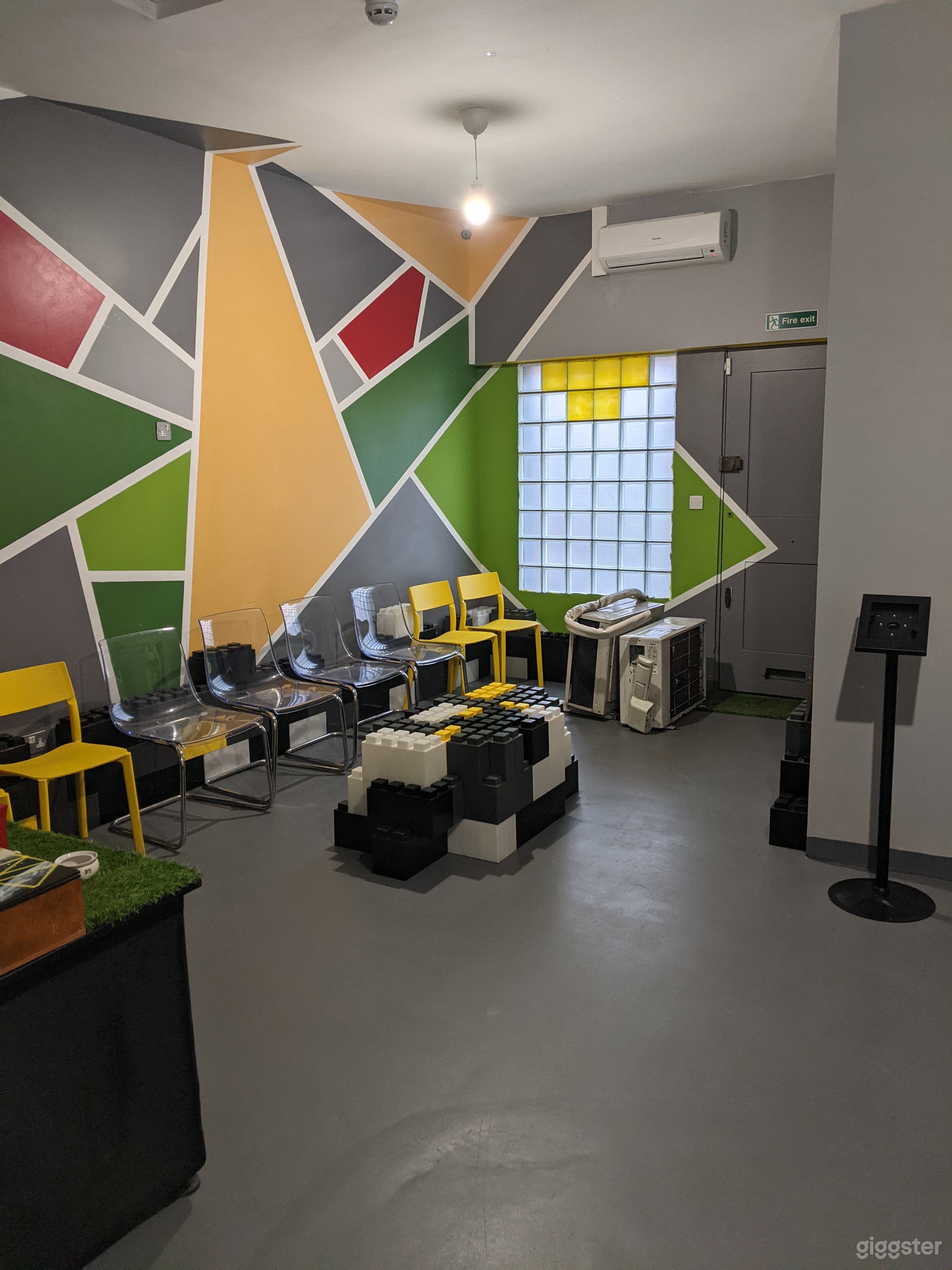 Apollo Room with colourful backdrop wall