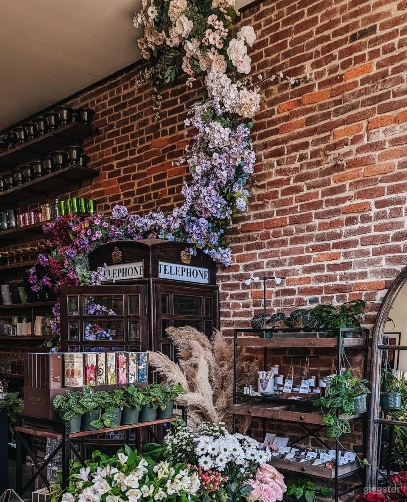 Telephone booth with floral install