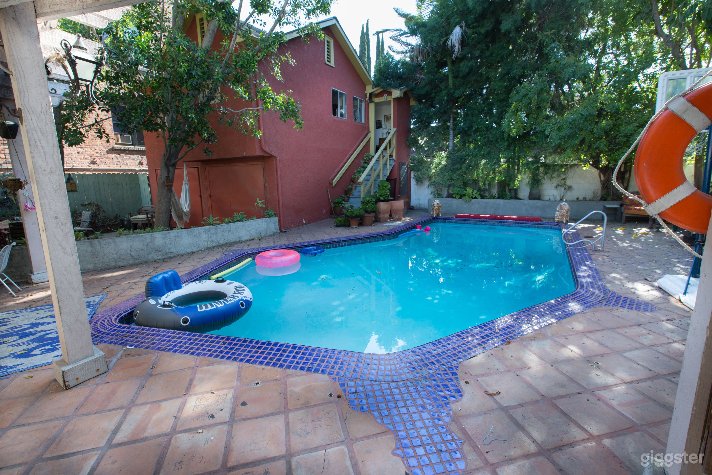 Large back area with pool.