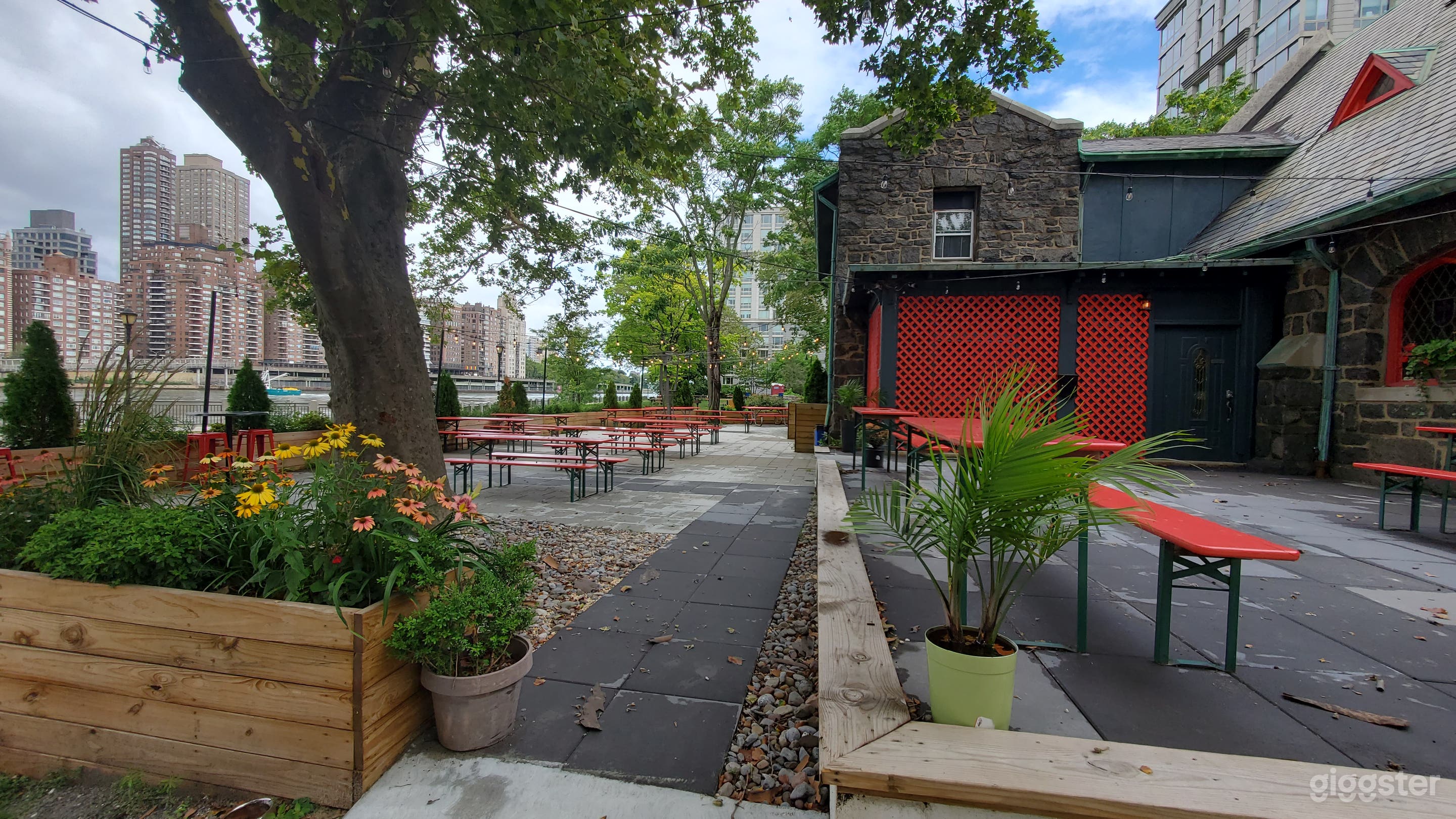 View from driveway of bi-level front patio