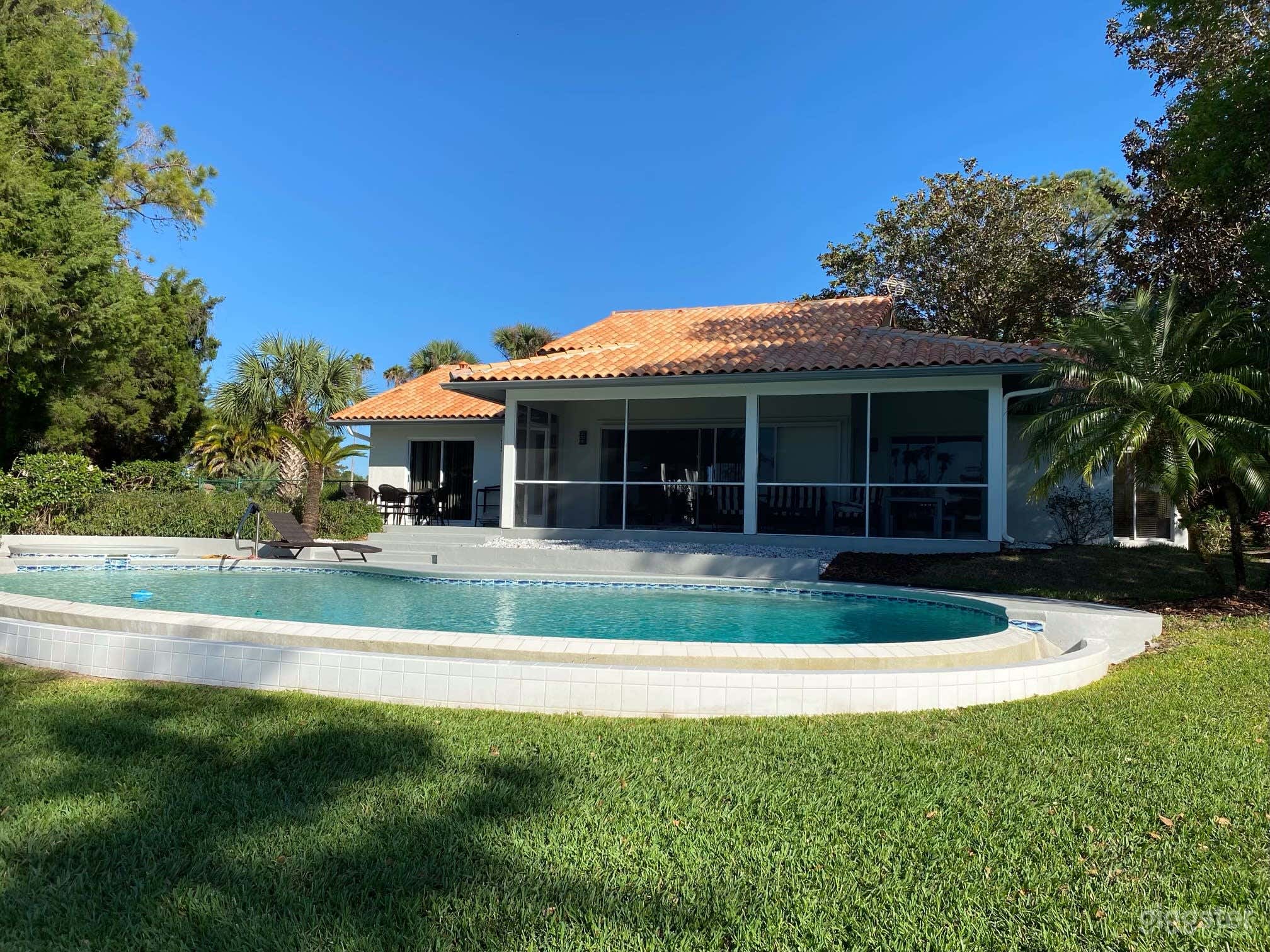 Classic Florida Poolside Retreat Photo 2