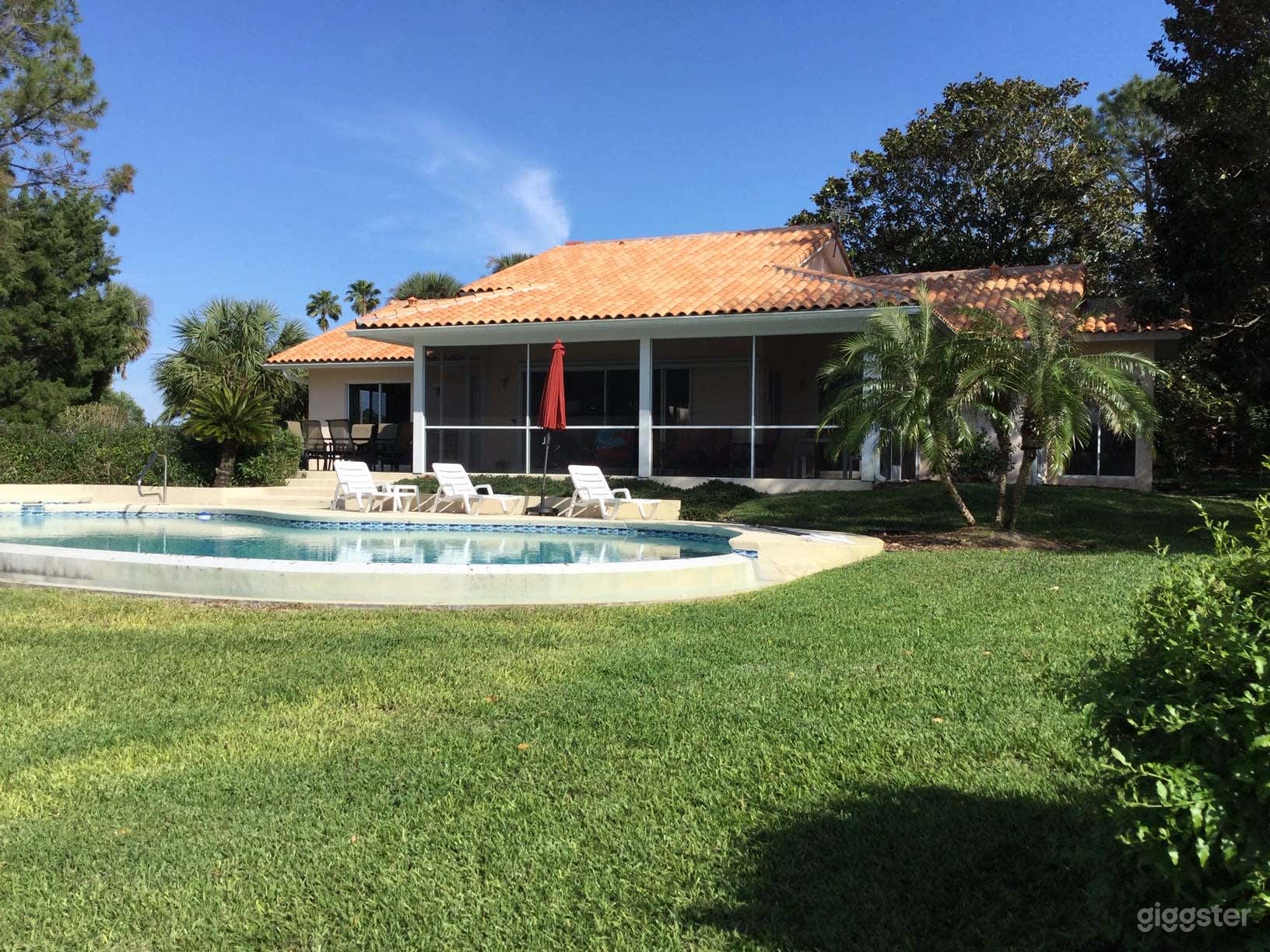 Classic Florida Poolside Retreat Photo 1