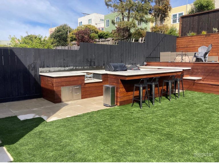  Backyard with full grill and party room 