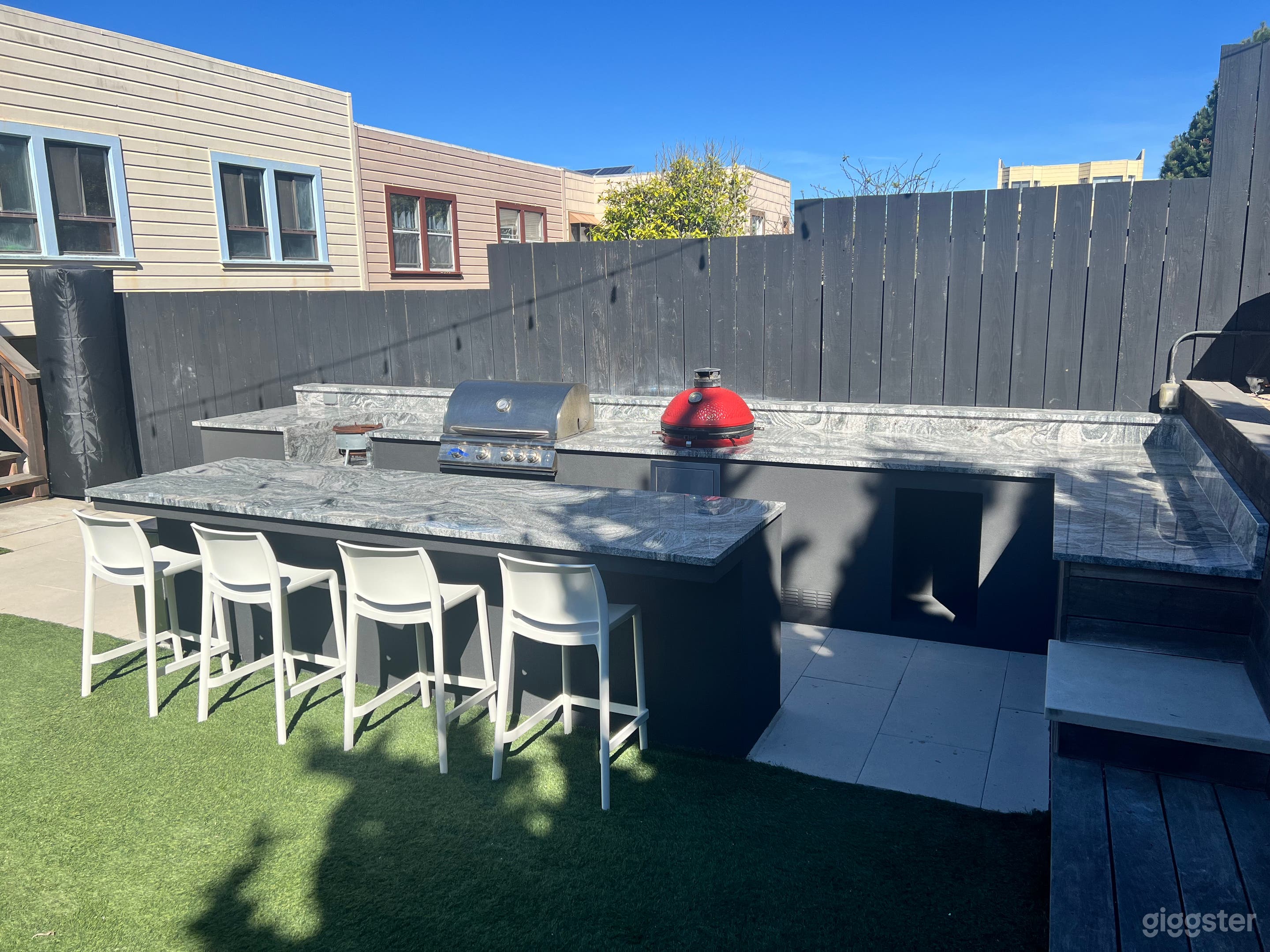 Backyard with full grill and party room Photo 3