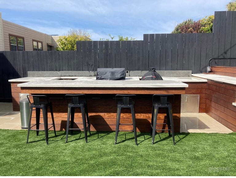  Backyard with full grill and party room 