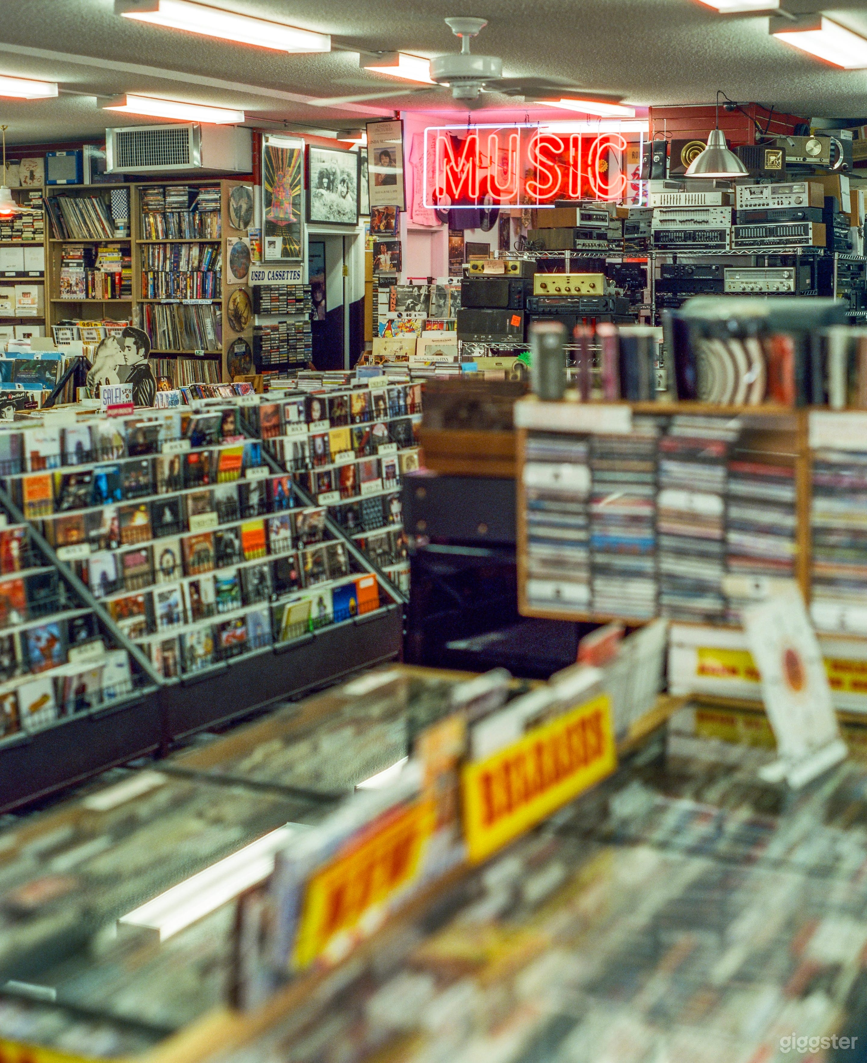 Vintage record shop with wall-to-wall memorabilia Photo 4