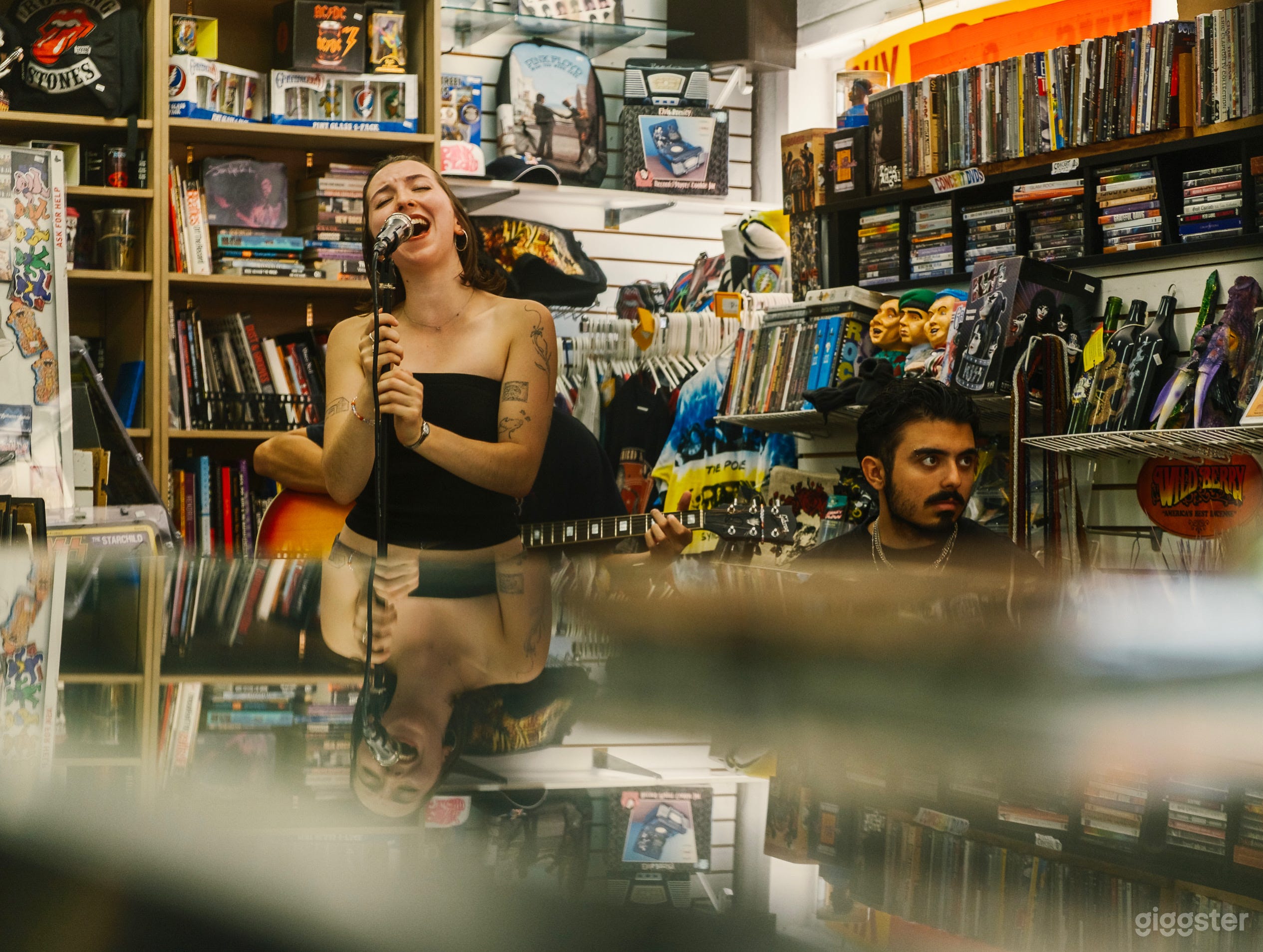 Vintage record shop with wall-to-wall memorabilia Photo 2