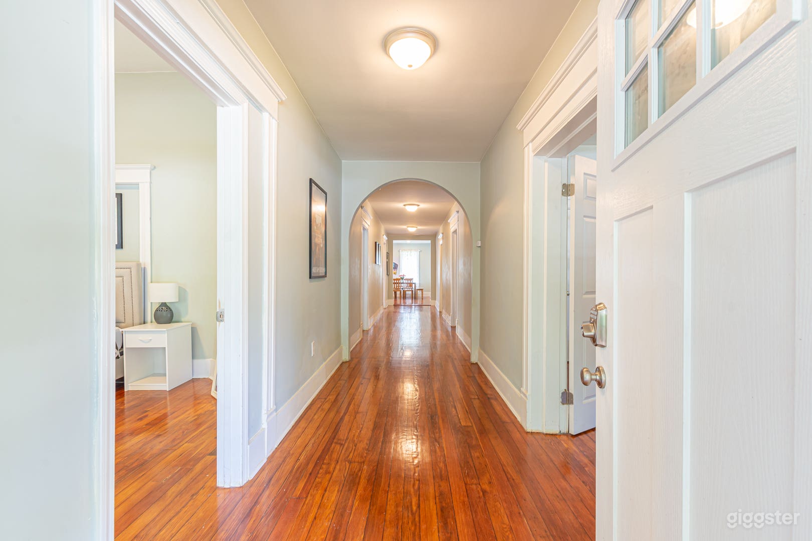 Unit A feels grandiose with its wide hallways and historic feel