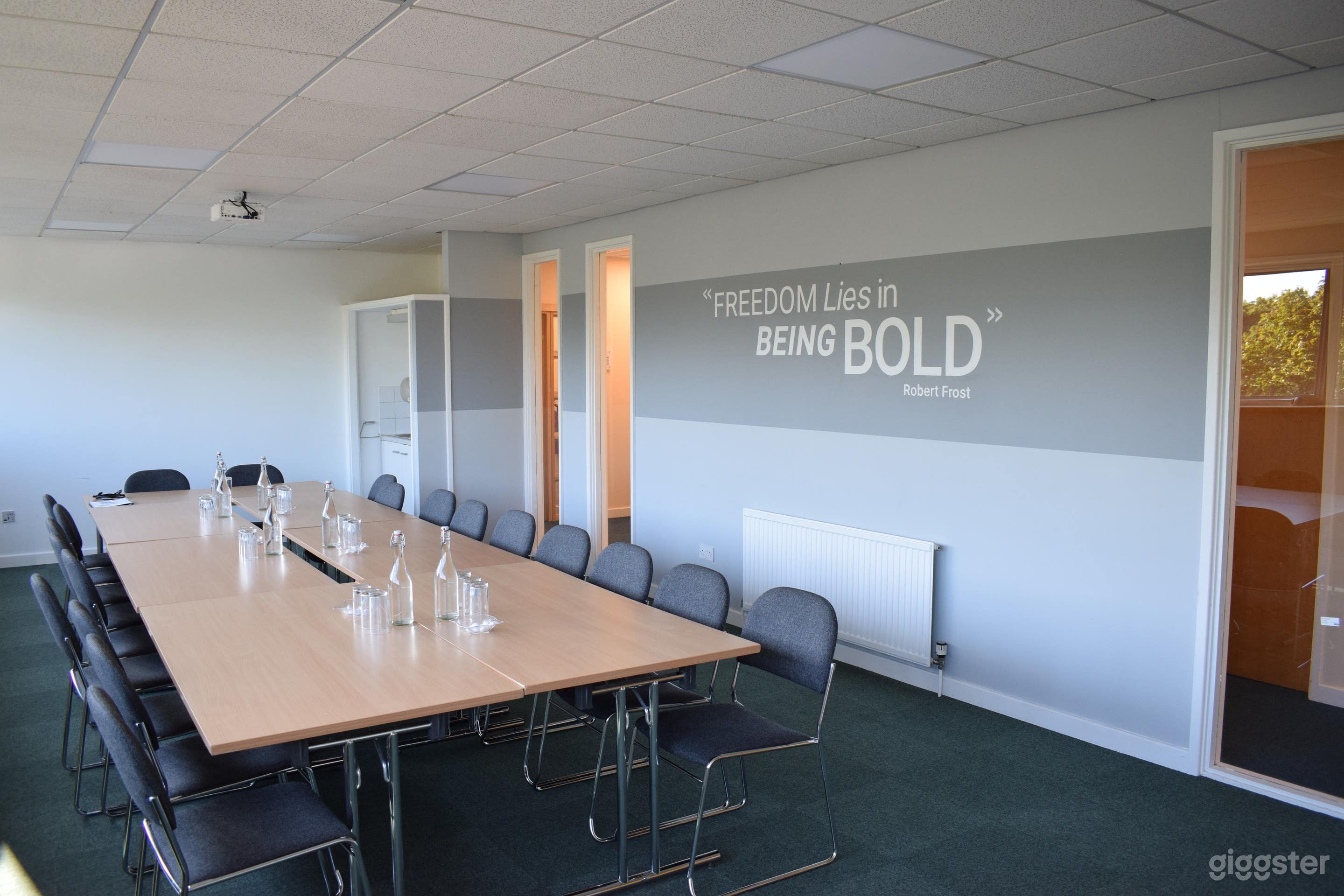 Gordon Room with Warm Green Tones Setting Photo 1