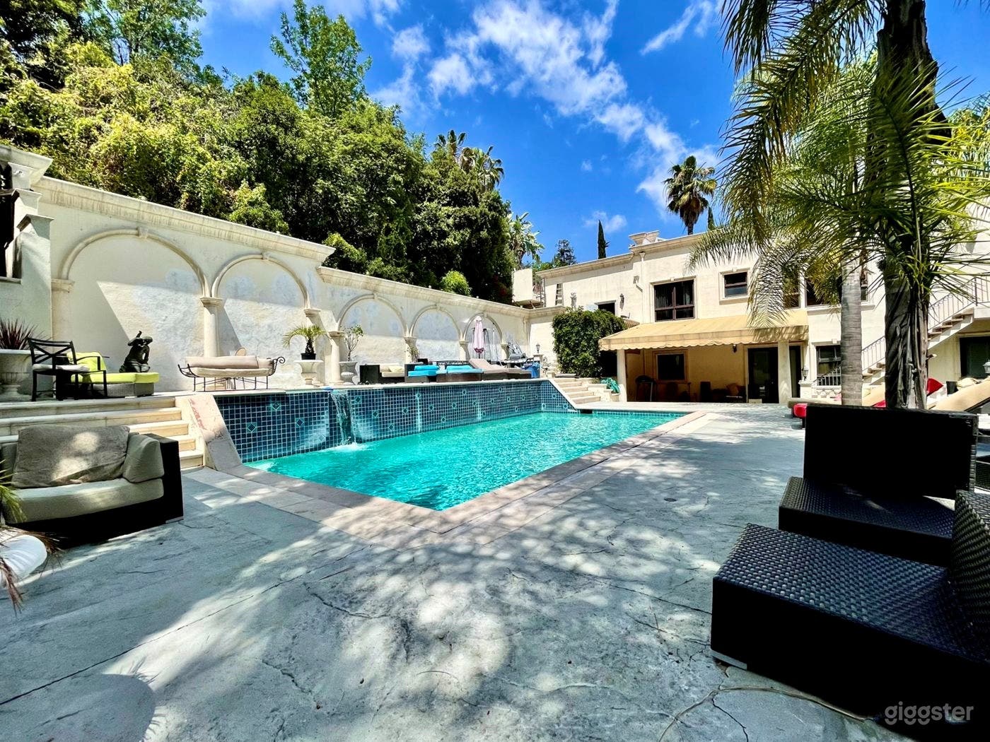 Crystal Clear Pool with Waterfall and Lounge Photo 2