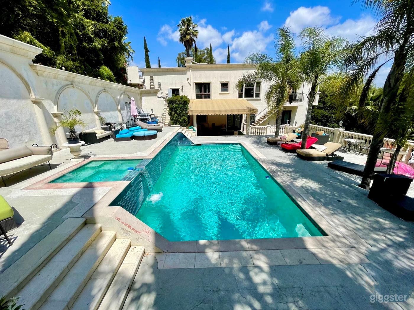 Crystal Clear Pool with Waterfall and Lounge Photo 1