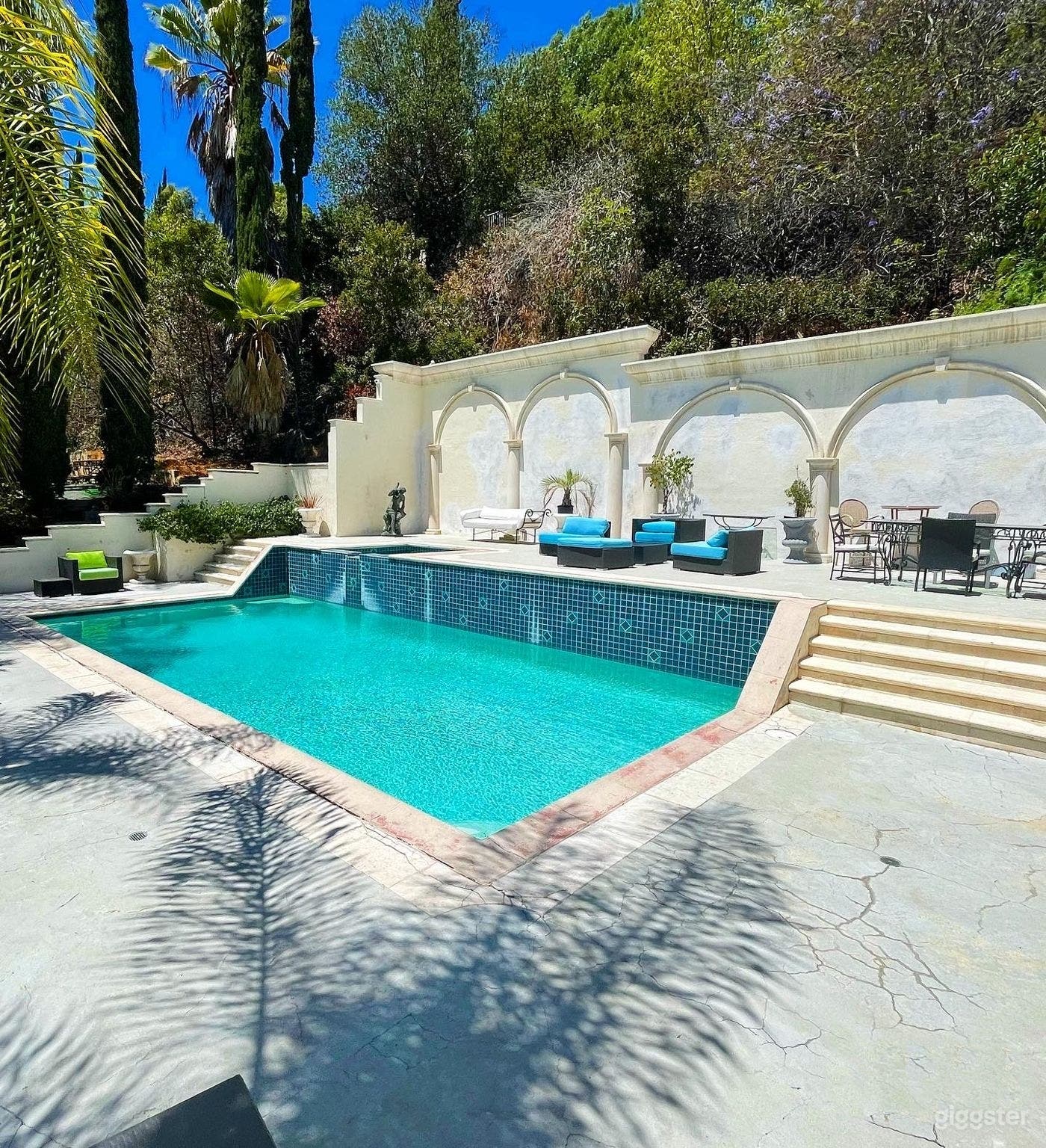Crystal Clear Pool with Waterfall and Lounge Photo 3
