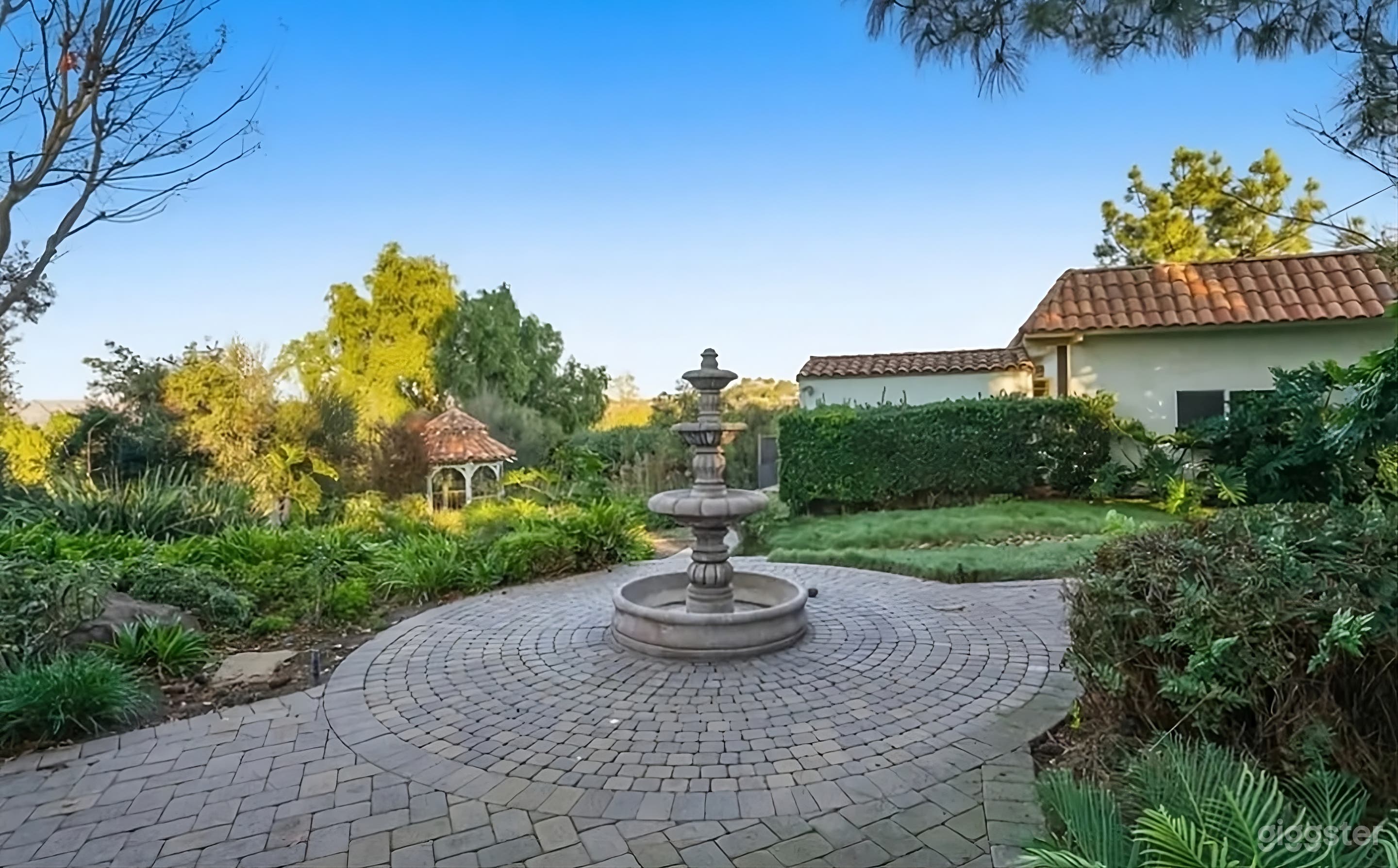 Lush Backyard Paradise with Hillside Views Photo 4