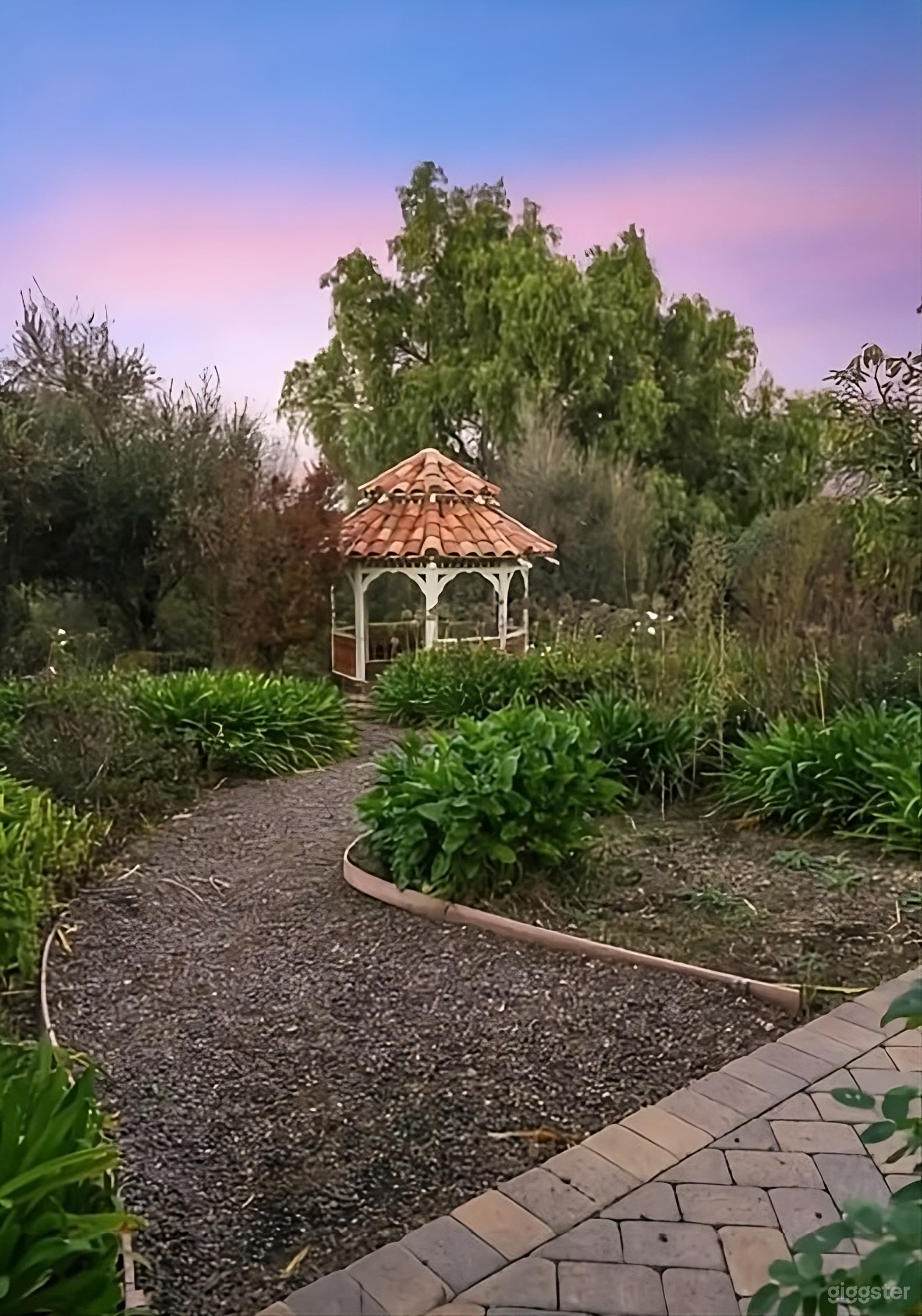 Lush Backyard Paradise with Hillside Views Photo 2