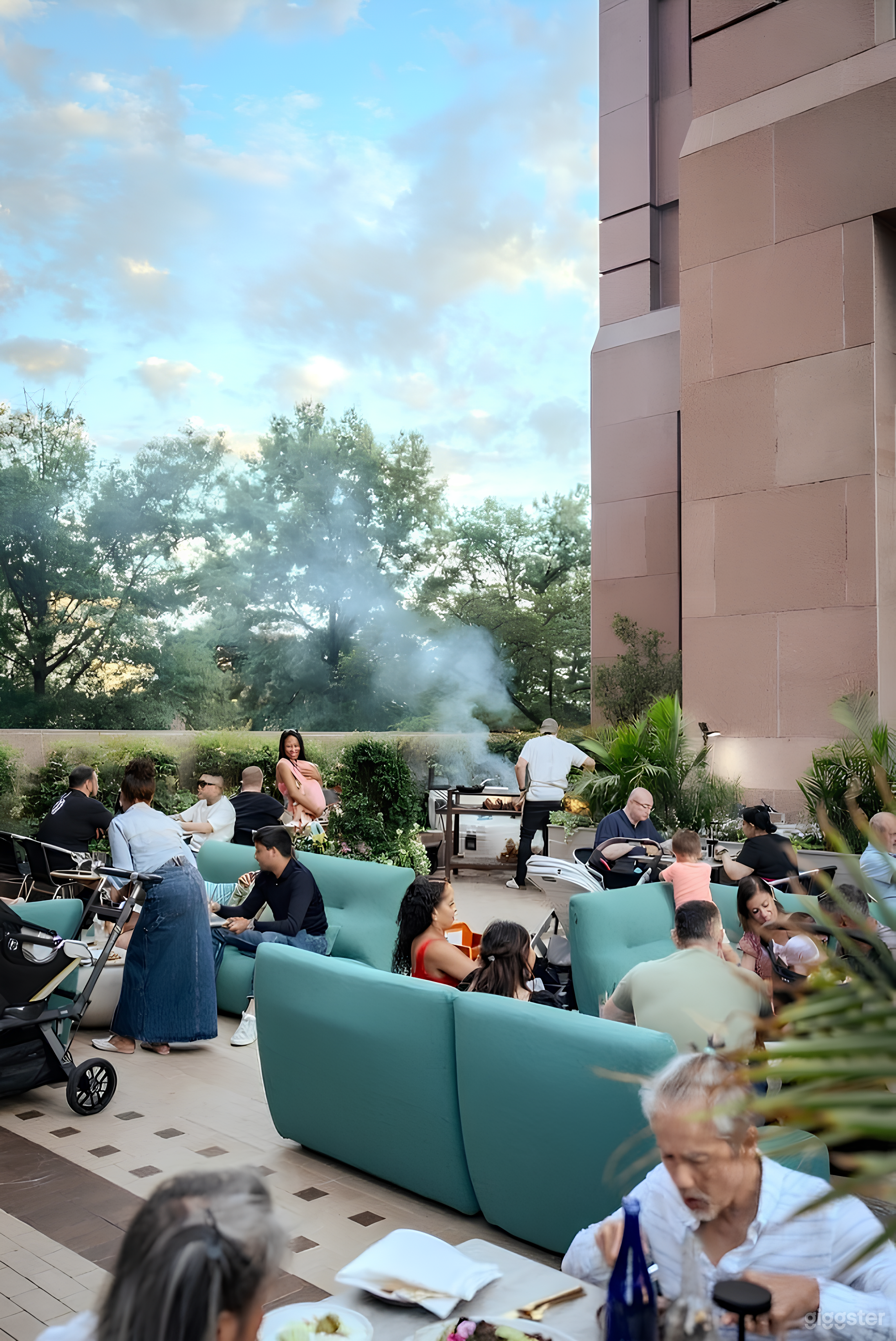 Shaded Outdoor Patio with DJ Booth & Live-Fire Grill Photo 4