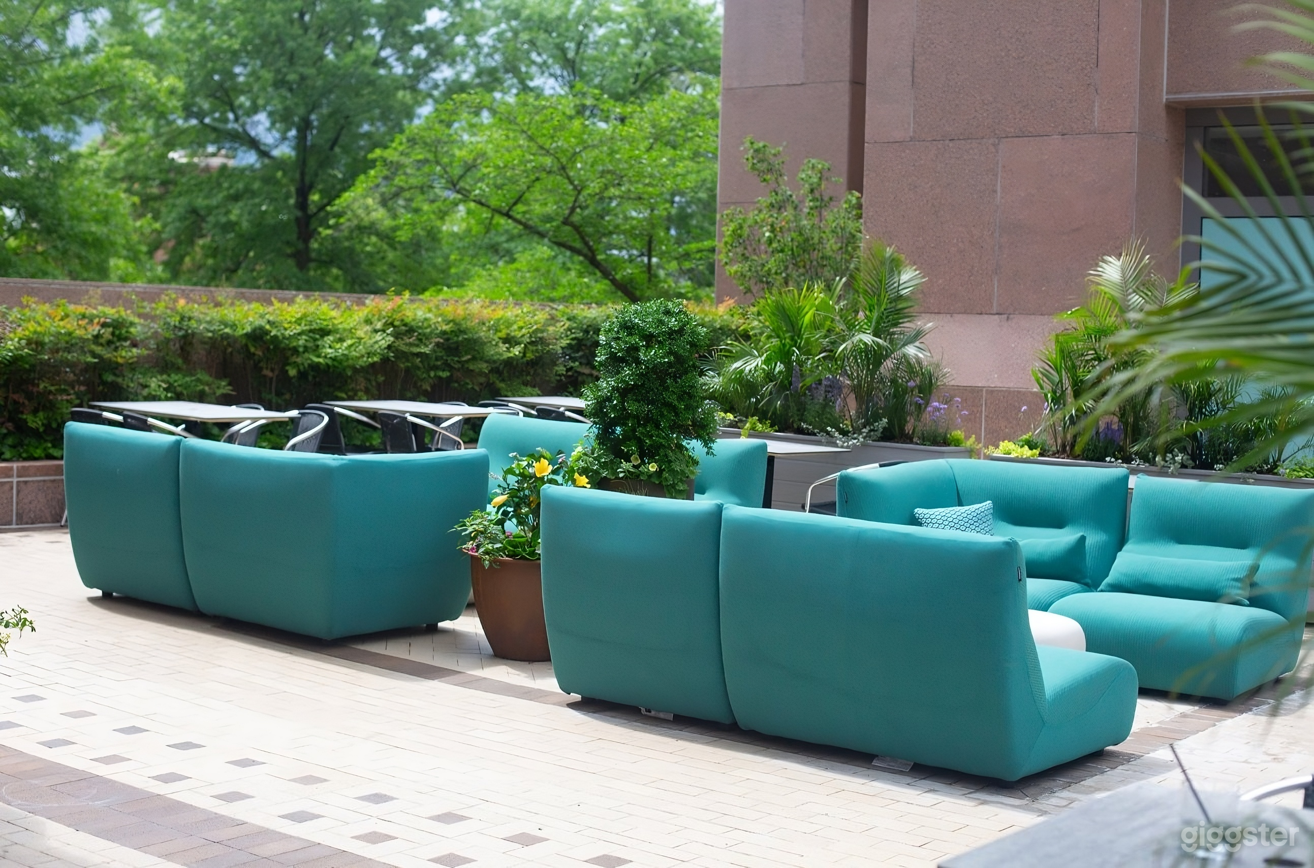 Shaded Outdoor Patio with DJ Booth & Live-Fire Grill Photo 1