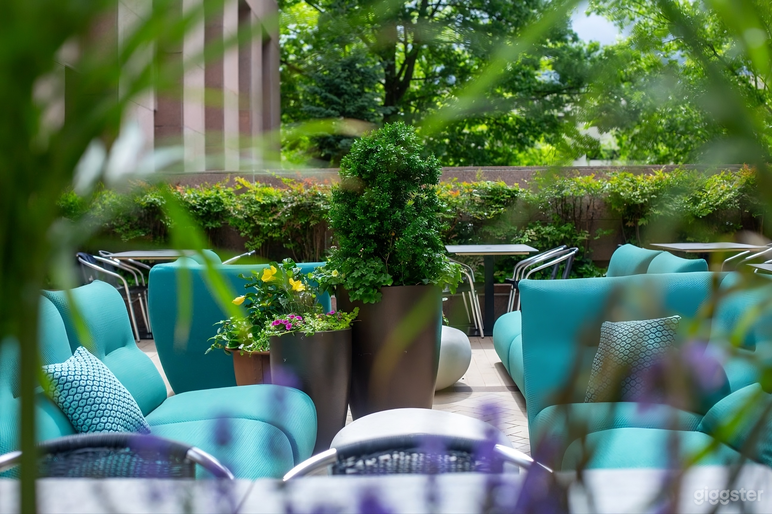 Shaded Outdoor Patio with DJ Booth & Live-Fire Grill Photo 3