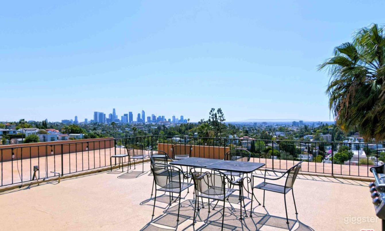 View of roof deck, and view from roof deck, facing east to downtown.