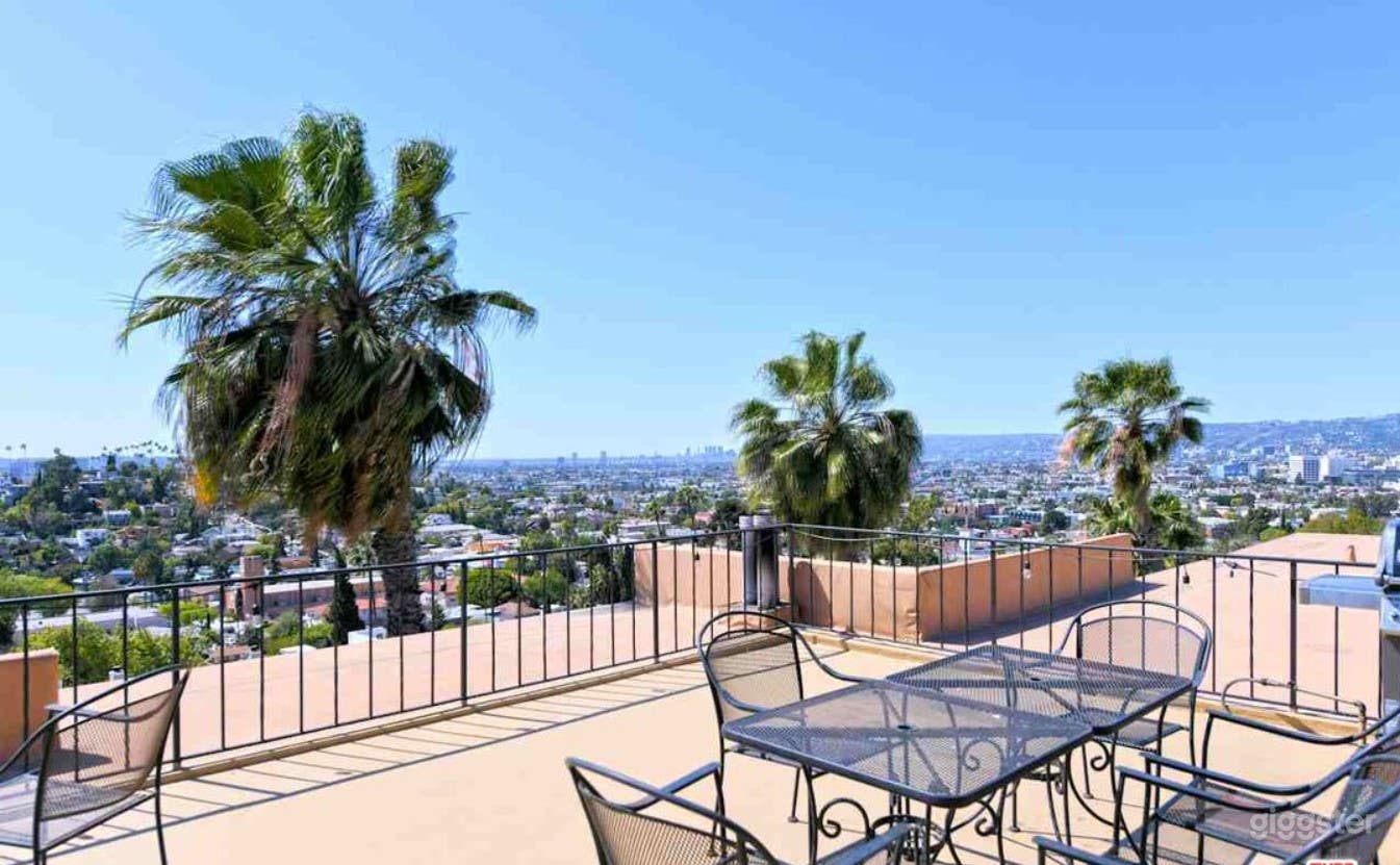 View of roof deck, and view from roof deck, facing west to ocean and Century City.