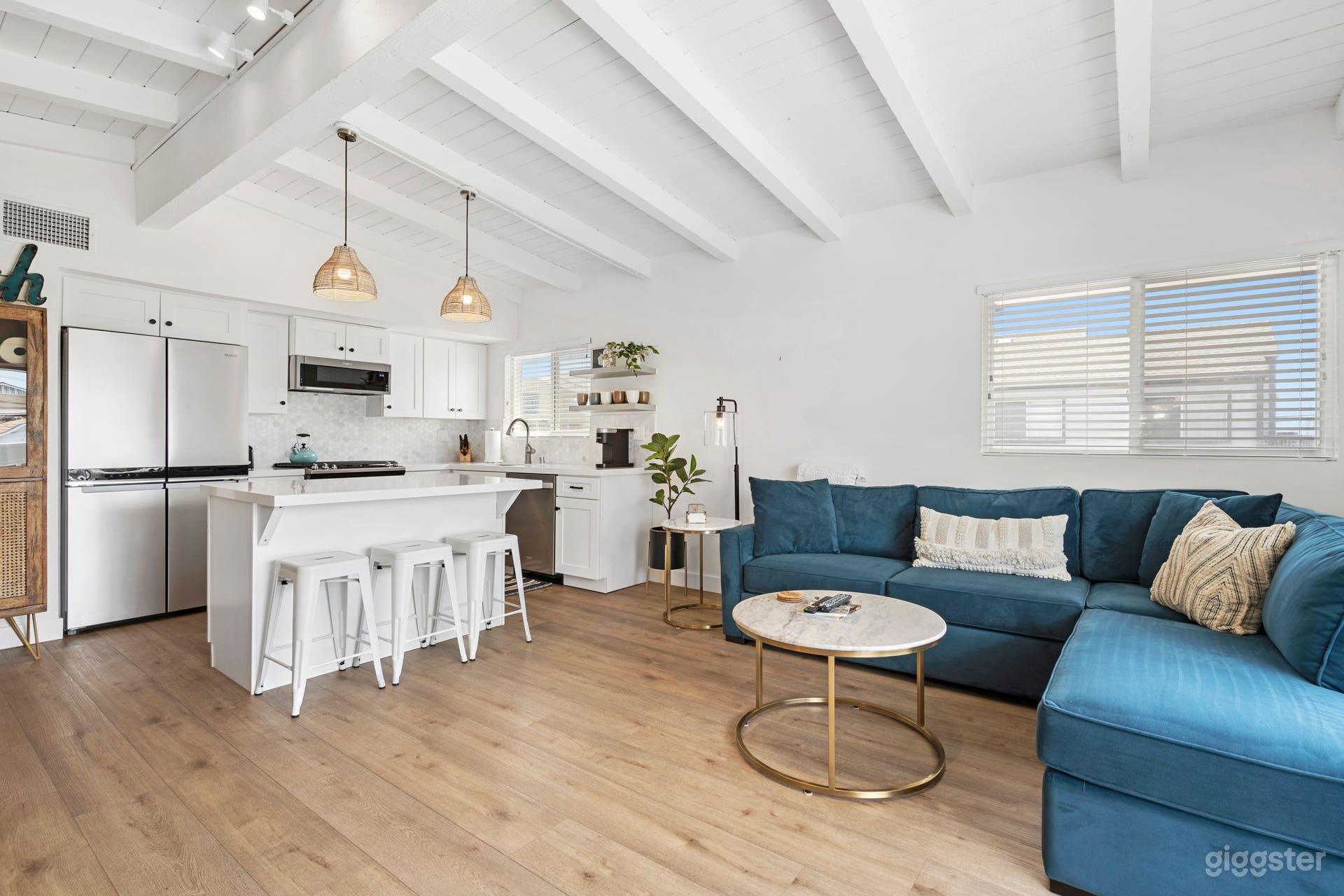 Blue Suede couch (now has 2 chairs and pictures on walls)
