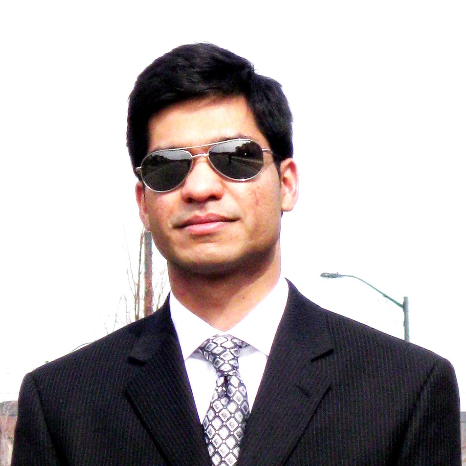 Ali E.